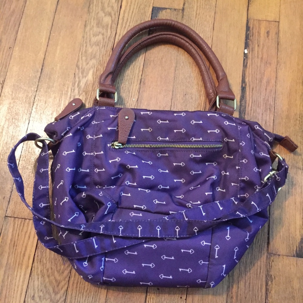 Spacious purple key purse